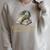 Easily Distracted By Dragons & Books Vintage Style Raglan Sleeve Sweatshirt Heather Forest Easily Distracted By Dragons & Books Vintage Style Raglan Sleeve Sweatshirt Heather Forest