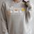Fall For a Great Book Science Of Reading Premium Tri-Blend Raglan Sleeve Sweatshirt Heather Forest