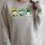 Gnomes Reading Books Teacher St Patricks Day Shamrock Irish Raglan Sleeve Sweatshirt Heather Forest