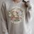 Go Away I'm Reading Librarian Skeleton Reading Book Lover Raglan Sleeve Sweatshirt Heather Forest