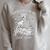 Good Girls Read Bad Books Skeleton Reading Book Halloween Raglan Sleeve Sweatshirt Heather Forest