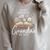 Grandma Est 2027 Best Chapter Yet Floral Book Premium Tri-Blend Raglan Sleeve Sweatshirt Heather Forest