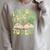 Groovy It's Good Luck To Read St Patrick's Day Book Lucky Raglan Sleeve Sweatshirt Heather Forest