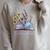 Grow Your Mind Wildflower Book Floral Motivation Raglan Sleeve Sweatshirt Heather Forest