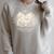 Haunted Library – Glowing Book Raglan Sleeve Sweatshirt Heather Forest