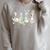 Just A Bookish Goose Bunny Easter Day Reading Book Lover Raglan Sleeve Sweatshirt Heather Forest