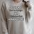 Just Give Me A Cup Of Coffee And A VC Andrews Book Raglan Sleeve Sweatshirt Heather Forest