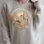 Just One More Chapter Book Lover Bookish Reading Skeleton Raglan Sleeve Sweatshirt Heather Forest