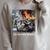 Just One More Chapter Dumpster Raccoon Reading Book Raglan Sleeve Sweatshirt Heather Forest