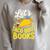 Let's Taco About Books Mexican Pun Bookworm Premium Tri-Blend Raglan Sleeve Sweatshirt Heather Forest