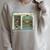 I Live In Two Worlds One Is A World Of Books Raglan Sleeve Sweatshirt Heather Forest