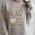 Love Unearth a Story Summer Reading 2026 Dino Skeleton Book Raglan Sleeve Sweatshirt Heather Forest