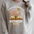 A New Chapter Begins Retired 2026 Floral Book Butterfly Tee Raglan Sleeve Sweatshirt Heather Forest