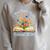 New Chapter Begins Retired 2026 Watercolor Floral Book Women Raglan Sleeve Sweatshirt Heather Forest