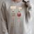 How Many Nights Reading Skeleton Book Lover Reader Raglan Sleeve Sweatshirt Heather Forest
