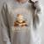 North Pole Book Club Christmas Reading Hot Cocoa Graphic Raglan Sleeve Sweatshirt Heather Forest