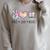 Peace Love Books Pastel Reading Heart Art For Book Lovers Raglan Sleeve Sweatshirt Heather Forest