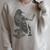 Raven Crow Reading a Magic Book Wizard Animal Bird Reader Raglan Sleeve Sweatshirt Heather Forest