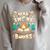 Read More Books Camping Outdoors Travel Campfire Smores Premium Tri-Blend Raglan Sleeve Sweatshirt Heather Forest