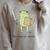 We Read At Dawn Bookish Frog Reading Raglan Sleeve Sweatshirt Heather Forest