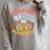 Reading Is A Ticket To Adventure Book Library Themed Raglan Sleeve Sweatshirt Heather Forest