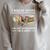 I Rescue Books Trapped In The Bookstore I'm Not A Hoarder Raglan Sleeve Sweatshirt Heather Forest I Rescue Books Trapped In The Bookstore I'm Not A Hoarder Raglan Sleeve Sweatshirt Heather Forest