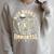 Skeleton I Buy Books Like I'm Immortal Halloween Raglan Sleeve Sweatshirt Heather Forest