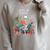 Skeleton Read In Peace Books And Plants Lover Bookworm Raglan Sleeve Sweatshirt Heather Forest