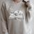 Sleepy Puppy On Open Book With Coffee For Readers Premium Tri-Blend Raglan Sleeve Sweatshirt Heather Forest