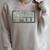 Star Wars The Book Of Boba Fett Logo V-1 Raglan Sleeve Sweatshirt Heather Forest Star Wars The Book Of Boba Fett Logo V-1 Raglan Sleeve Sweatshirt Heather Forest