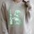 Star Wars The Book Of Boba Fett Outlaw Box Up Raglan Sleeve Sweatshirt Heather Forest Star Wars The Book Of Boba Fett Outlaw Box Up Raglan Sleeve Sweatshirt Heather Forest
