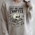 Tales Of The Macabre Skull Book Gothic Books Reading Lover Raglan Sleeve Sweatshirt Heather Forest