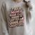 Tired Moms Book Club Coffee Sarcasm Jokes Dad Humor Premium Tri-Blend Raglan Sleeve Sweatshirt Heather Forest
