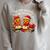 ’Tis The Season To Be Reading Book Lover Raglan Sleeve Sweatshirt Heather Forest ’Tis The Season To Be Reading Book Lover Raglan Sleeve Sweatshirt Heather Forest