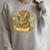 Triceratops Dinosaur Reading Book Flowers Floral Raglan Sleeve Sweatshirt Heather Forest