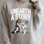 Unearth A Story Astronaut Finds Book On The Moon Raglan Sleeve Sweatshirt Heather Forest