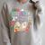 Unearth A Story Library Book Reading Program 2026 Summer Raglan Sleeve Sweatshirt Heather Forest Unearth A Story Library Book Reading Program 2026 Summer Raglan Sleeve Sweatshirt Heather Forest