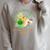 Unearth a Story Summer Reading 2026 Dinosaur Book Kids Raglan Sleeve Sweatshirt Heather Forest Unearth a Story Summer Reading 2026 Dinosaur Book Kids Raglan Sleeve Sweatshirt Heather Forest