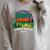 Unearth a Story Summer Reading 2026 Dinosaur T-Rex Book Raglan Sleeve Sweatshirt Heather Forest