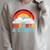 Unearth a Story Summer Reading 2026 Vintage Book Rainbow Raglan Sleeve Sweatshirt Heather Forest Unearth a Story Summer Reading 2026 Vintage Book Rainbow Raglan Sleeve Sweatshirt Heather Forest