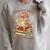 Unearth a Story Summer Reading T-Rex Book Lover Raglan Sleeve Sweatshirt Heather Forest