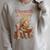 Unearth a Story Triceratops Dinosaur Reading Books Dino Raglan Sleeve Sweatshirt Heather Forest Unearth a Story Triceratops Dinosaur Reading Books Dino Raglan Sleeve Sweatshirt Heather Forest