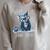 We'Re All Mad Here Cheshire Cat Alice Wonderland Book Kids Raglan Sleeve Sweatshirt Heather Forest