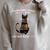 A Woman Cannot Survive On Books Alone She Also Needs CAT Raglan Sleeve Sweatshirt Heather Forest