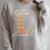 A Woman Cannot Survive On Books Alone She Also Needs Dogs Raglan Sleeve Sweatshirt Heather Forest