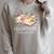 Women A New Chapter Begins Floral Book Retirement Teacher Raglan Sleeve Sweatshirt Heather Forest