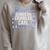 Women's DCC Logo With Marquee Icons Book Series Raglan Sleeve Sweatshirt Heather Forest