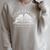 Women's First Edition Published 2025 The Littlest Book Club Member Raglan Sleeve Sweatshirt Heather Forest Women's First Edition Published 2025 The Littlest Book Club Member Raglan Sleeve Sweatshirt Heather Forest