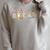 Women's Group Bunny Corgis Easter Reading Book Hunting Eggs Owner Raglan Sleeve Sweatshirt Heather Forest