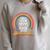 Women's Rainbow Book Saying Take A Look Its In A Book Raglan Sleeve Sweatshirt Heather Forest